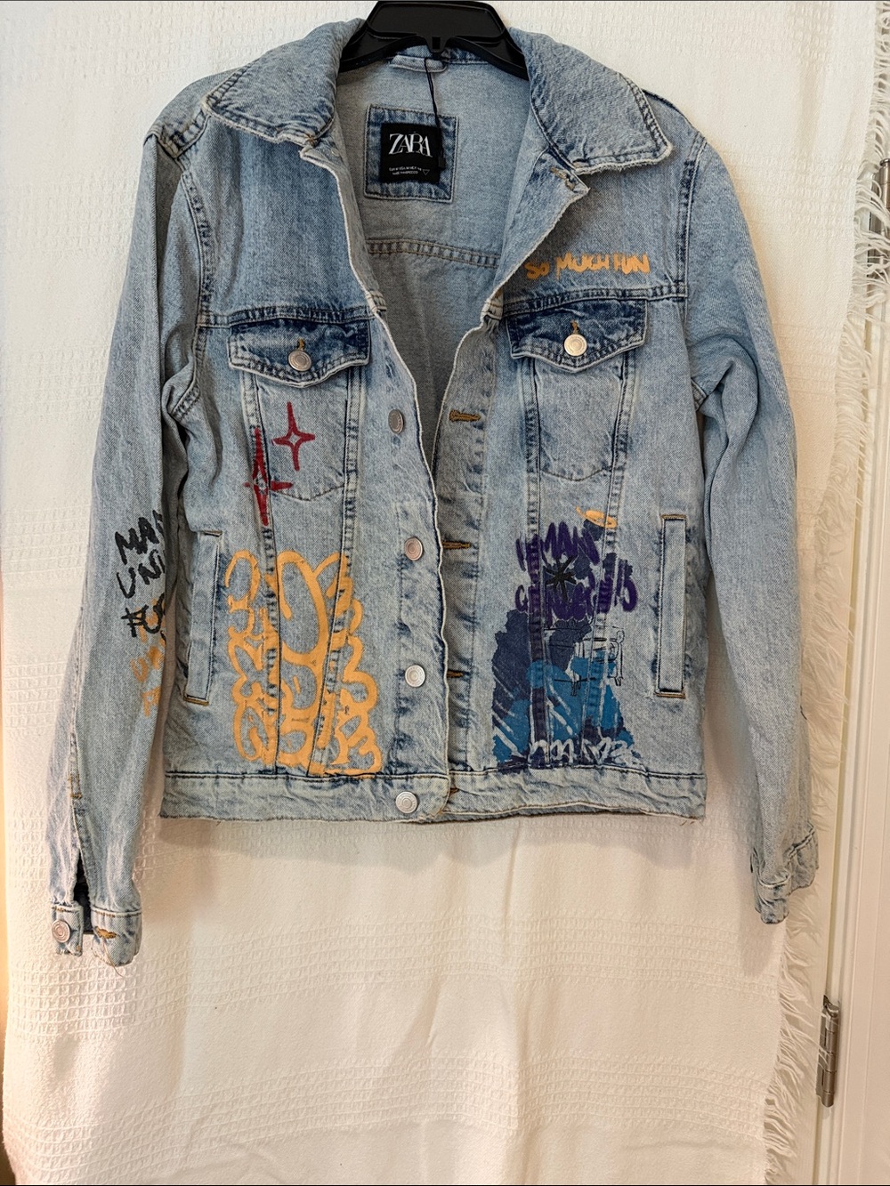 ZARA Light Blue Denim Jacket with Multicolor Graphic Accents